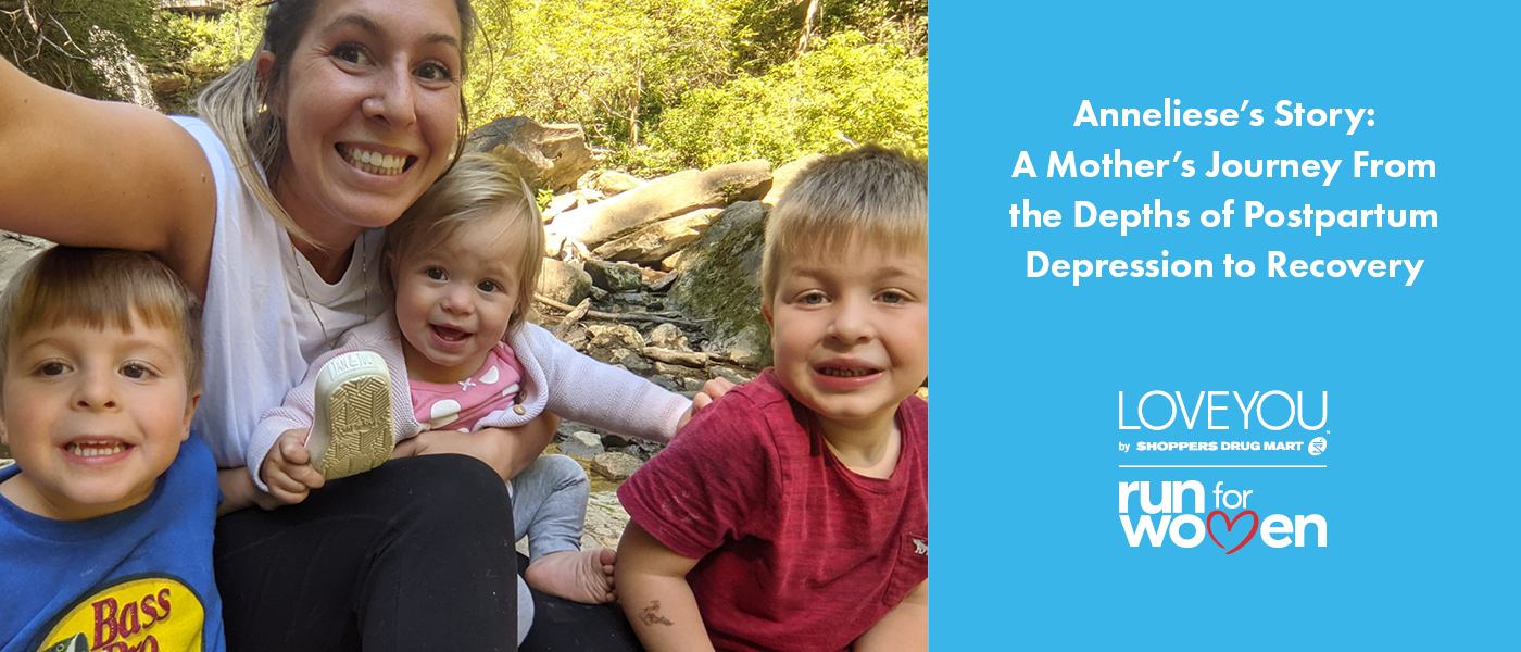 Anneliese Lawton takes a selfie with her three children. There is a white heading on a blue background that says, "Anneliese's story: A Mother's Journey From the Depths of Postpartum Depression to Recovery"